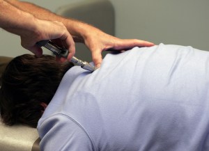 Activator Chiropractic Adjustment